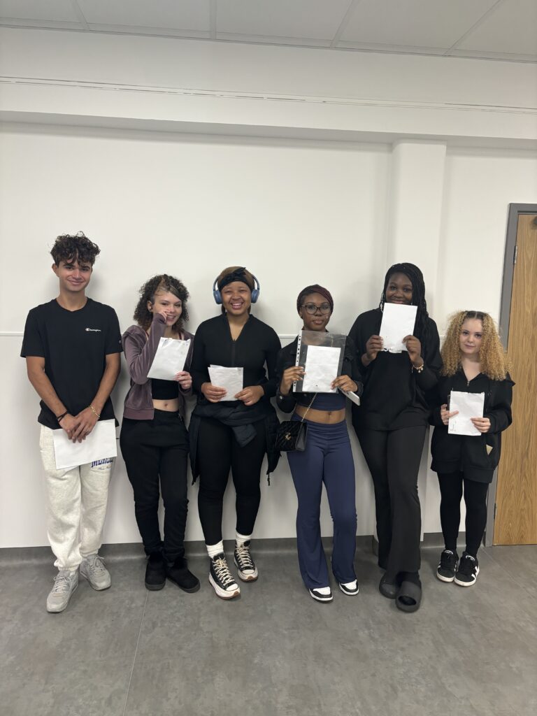 Students holding their results