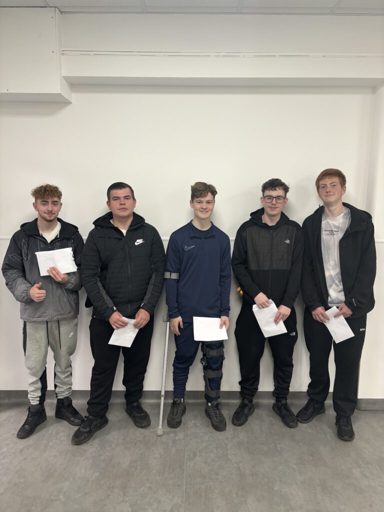 Students holding their results