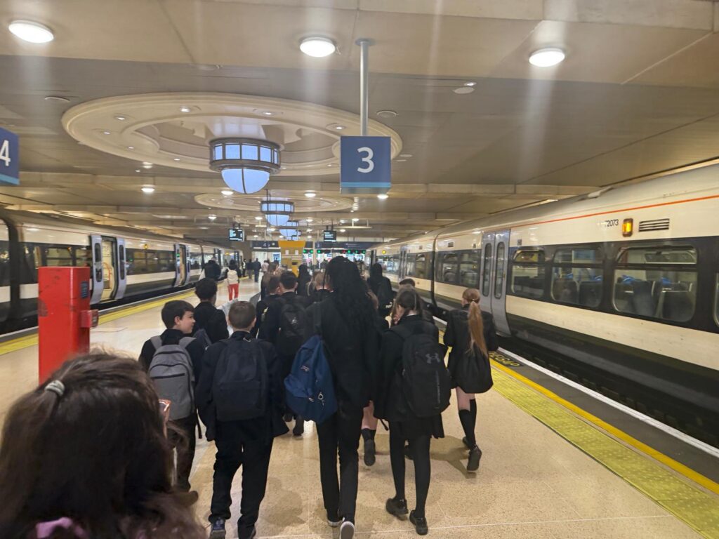 Students in a train station